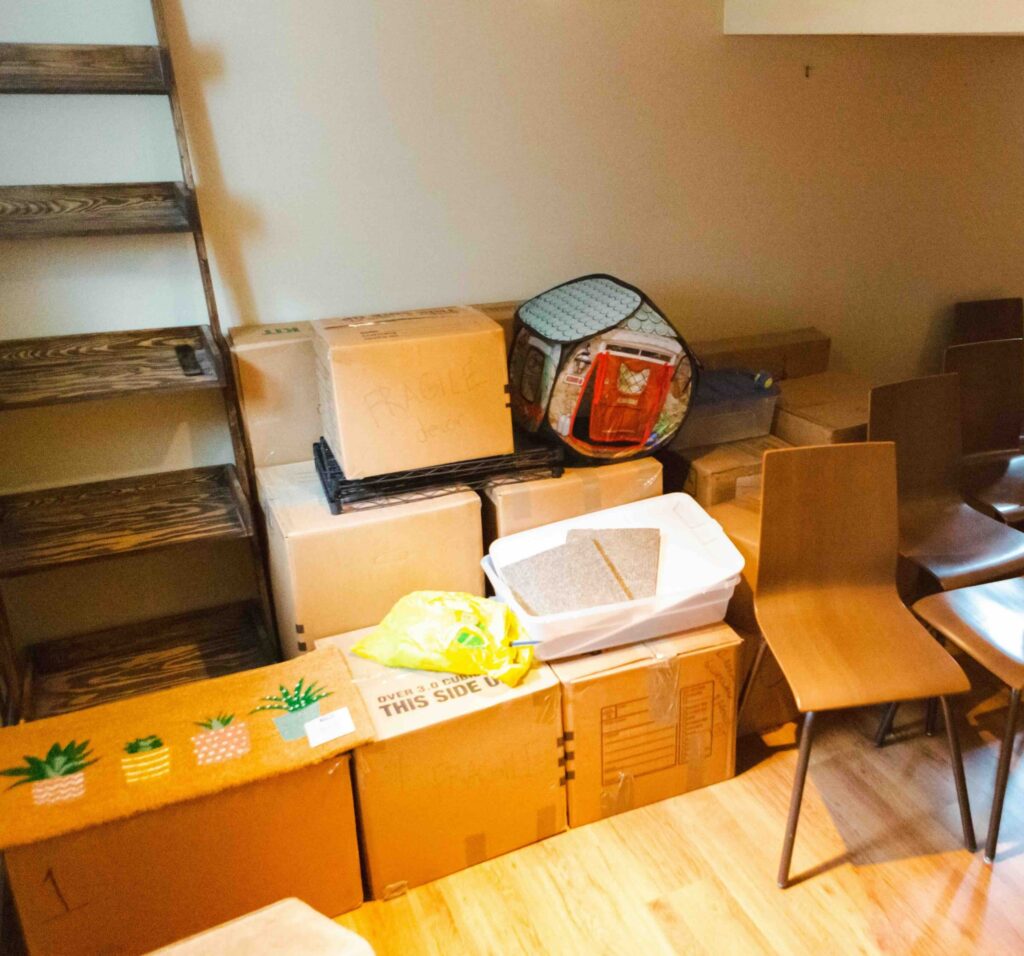 Photo of a cluttered home in need of a decluttering. Learn how to declutter with Port City Containers.