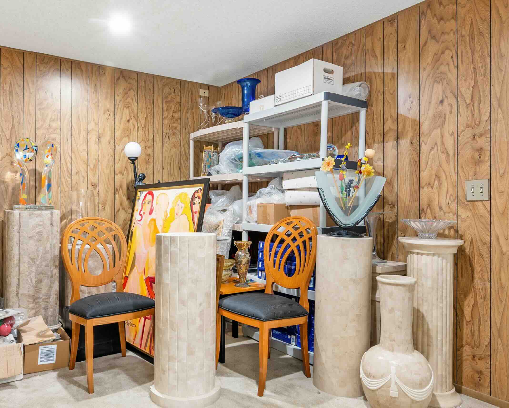 Photo of a basement in need of a clean out.