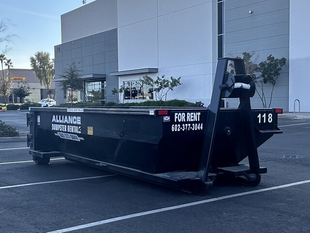 A photo of a 10 yard dumpster from Alliance, who offers delivery.